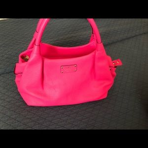 Bright pink Kate spade bag